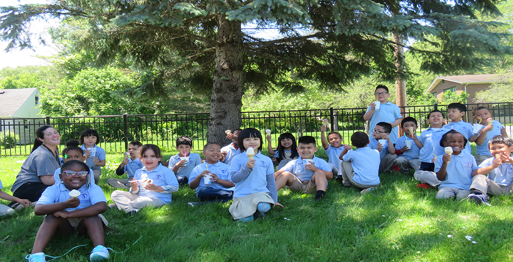 Atoms receive financial education and learn the value of a dollar with the help of Empower Federal Credit Union's Dollar Dog Program