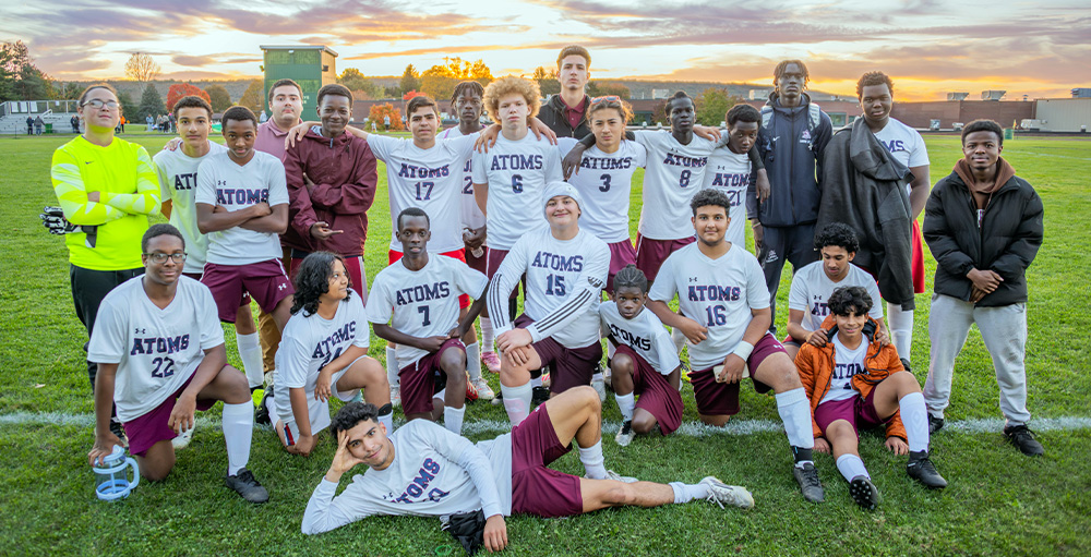 The Citizenship & Science Academy of Syracuse Varsity Soccer Team Celebrates Second Win of the Season